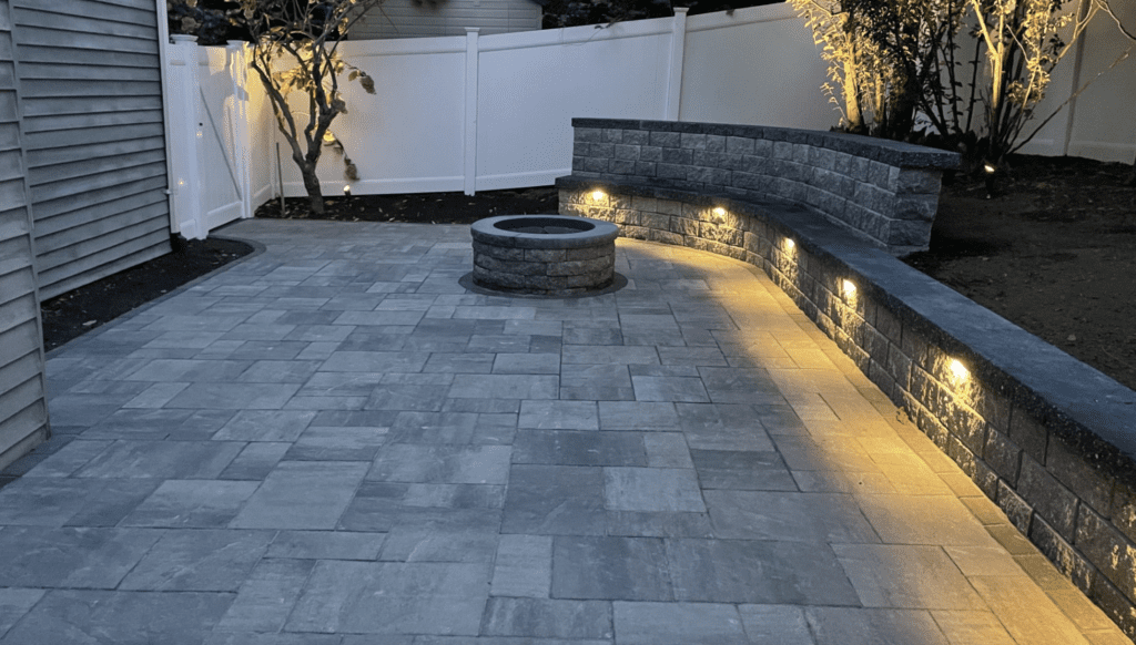 Outdoor fire pit with landscape lighting - Leahy Landscaping outdoor fire pit with landscape lighting by Leahy Landscaping