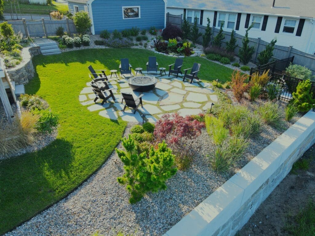 Newburyport fire pit design and installation with stone patio